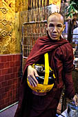 Buddhist monk at Mahamuni Paya, Mandalay, Myanmar 